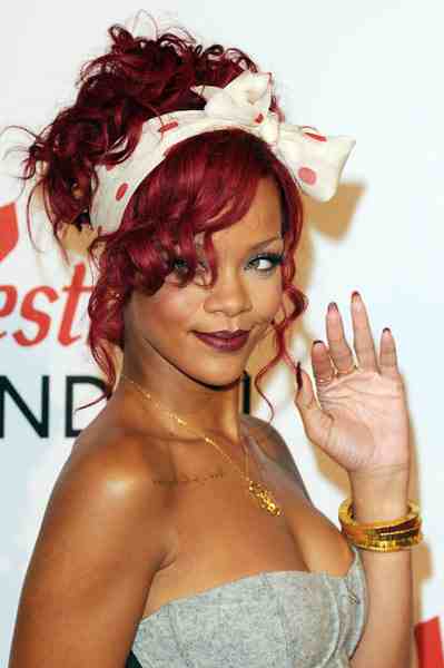 rihanna red hair up. Rihanna Lights Up London for